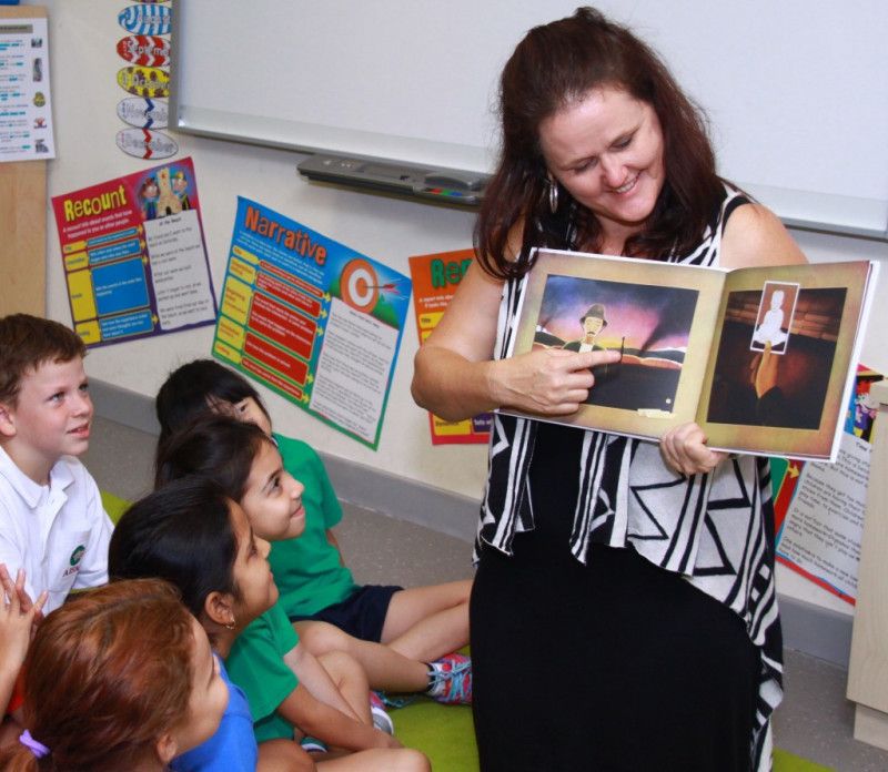 Kerry with AISM students during a storytelling session.